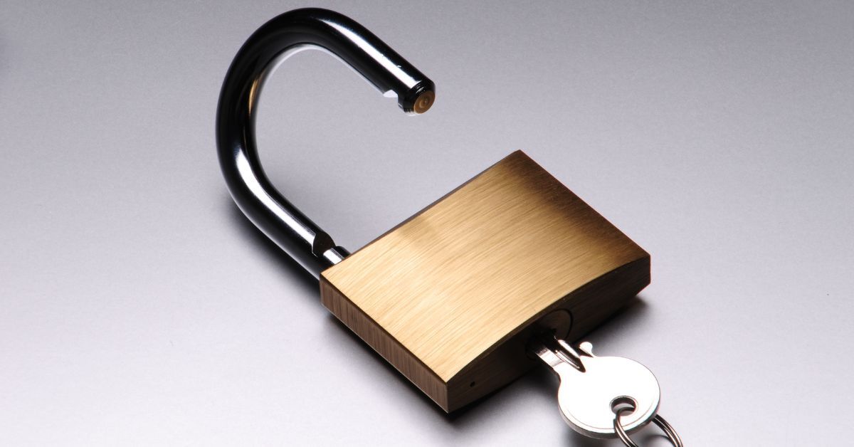 unlocked padlock with key inside