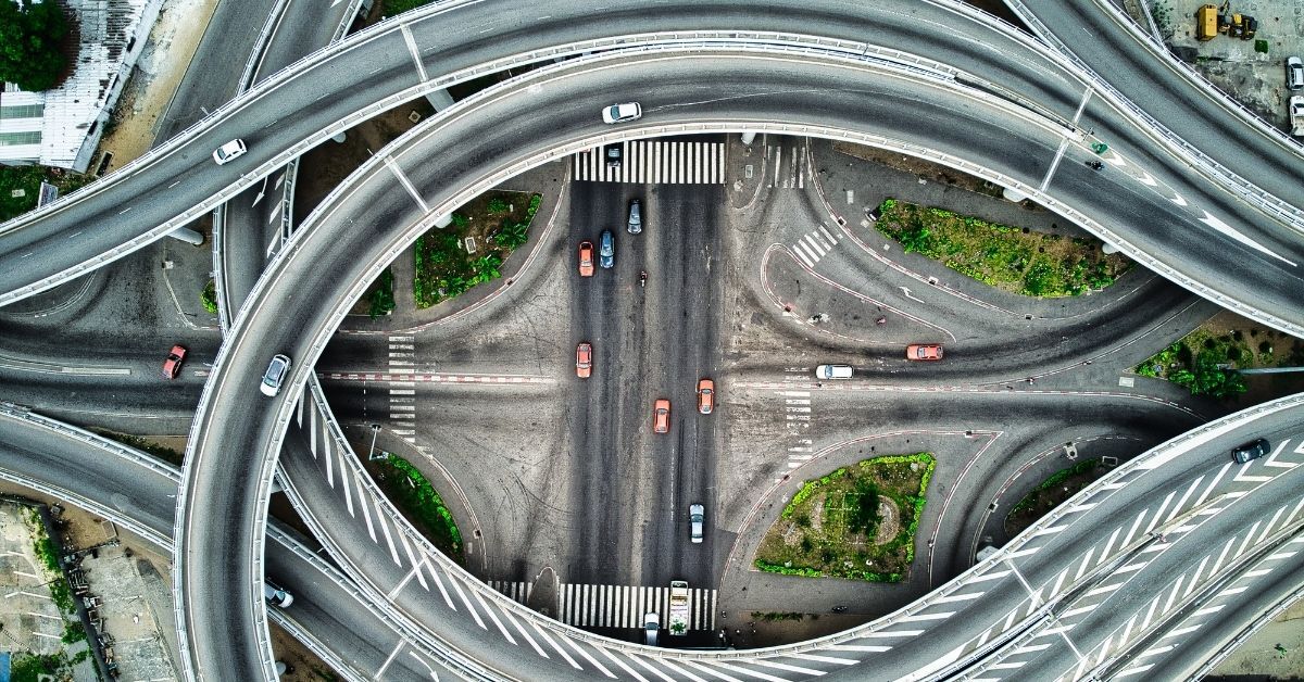 Winding highway with cars driving in varying directions